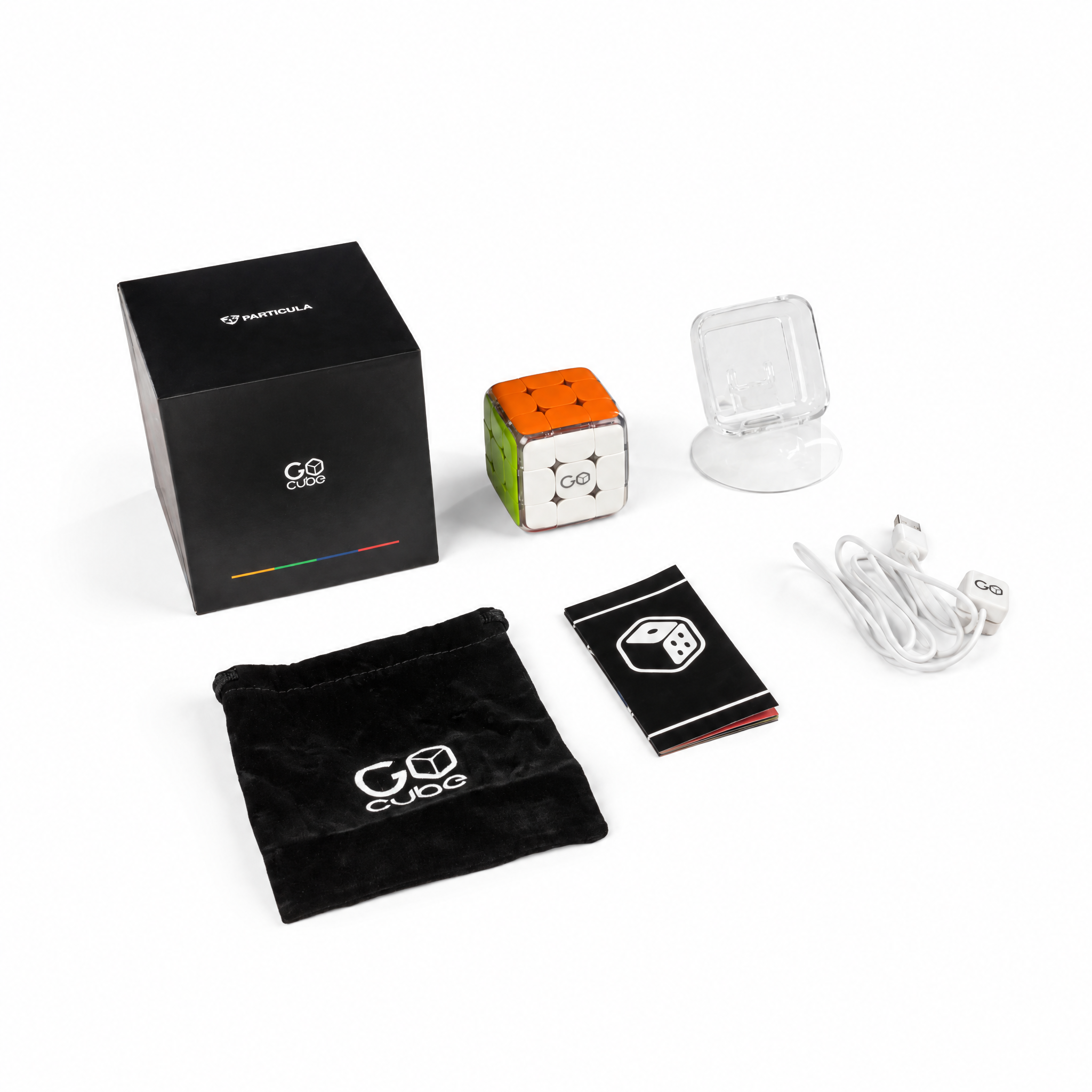 Everything in the Full Pack: the box, the cube, the stand, the charger, the pouch and the guide